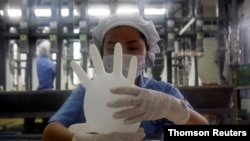 FILE PHOTO: Labour issues prompt U.S. bar on imports of Malaysia's Top Glove