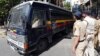 A police van transports some of those convicted in connection with a series of blasts in 1993, outside a court in Mumbai, India, June 16, 2017.