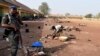 Un policier monte la garde dans un camp de personnes déplacées à Benue, dans le centre-nord du Nigeria, le 3 janvier 2018.