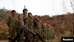 ကိုးကန့်တပ်ဖွဲ့ဝင်များ။