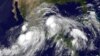 FILE - Hurricane Ingrid in the Gulf of Mexico approaching the coast of Mexico and tropical storm Manuel just off the western coast of Mexico, 15, 2013. 