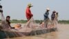 Villagers are net fishing in the Tonle Sap Lake, in Kampong Chhnang province, Cambodia, on March 12, 2020. (Sun Narin/VOA Khmer) 
