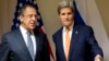 U.S. Secretary of State John Kerry, right, gestures as he meets with Russian Foreign Minister Sergey Lavrov about Syria, in Zurich, Switzerland, Jan. 20, 2016.