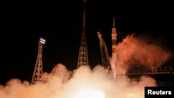 La capsule Soyouz au décollage de Baïkonour, au Kazakhstan (Reuters)