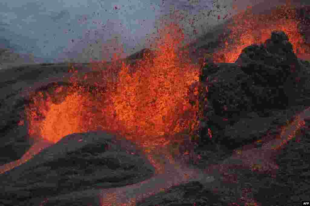 Lava flows during an eruption of the Piton de la Fournaise volcano on the French island of La Reunion.