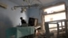 FILE - A medic inspects the damage inside Anadan Hospital, sponsored by Union of Medical Care and Relief Organizations, after it was hit by an airstrike in the rebel-held city of Anadan, northern Aleppo province, Syria, July 31, 2016.