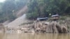 Chinese engineers doing test drilling for the Mong Ton Dam on the Salween River.