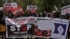 FILE - Protesters march in Blantyre, Malawi, Nov. 16, 2020, against increased cases of sexual abuse against women and girls. A group of women's lawyers is now accused of double-dipping while representing women in a rape case. (Lameck Masina/VOA)