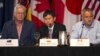Australian Trade Minister Andrew Robb (L-R), Brunei Permanent Secretary of Trade Lim Jock Hoi, and Canadian Trade Minister Ed Fast participate in a news conference in Lahaina, Maui, Hawaii July 31, 2015