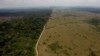 FILE - This Sept. 15, 2009 file photo shows a deforested area near Novo Progresso in Brazil's northern state of Para. Brazil's government says destruction of its Amazon rainforest has jumped by 28 percent. The sharp jump in deforestation came in the August 2012 through July 2013 period, the time when Brazil measures the annual destruction of the forest. (AP Photo/Andre Penner, File)