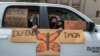 FILE - An immigrant family joins members of Coalition for Humane Immigrant Rights of Los Angeles on a vehicle caravan rally to support the Deferred Action for Childhood Arrivals Program (DACA), around MacArthur Park in Los Angeles, June 18, 2020. 