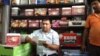 Like thousands of businesses as currency shortages ease, sales have bounced back for Charanjit Yadav, who sells generator sets and batteries in the business hub of Gurugram near New Delhi. (A. Pasricha/VOA)