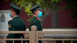 VOA Asia - Tensions rise over pandemic origins