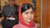Pakistani activist Malala Yousafzai, who survived being shot by the Taliban because she advocated education for girls, visits Abuja, Nigeria, July 13, 2014.