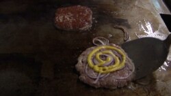 myBurgerLab’s combination of traditional Western-style burgers as well as creative flavors have made it a hit with greater Kuala Lumpur's middle class crowd. (Dave Grunebaum/VOA)