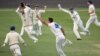 Australian cricket team bowler bowler Mitchell Starc celebrates with team mates after claiming his second hat-trick of the match to lead New South Wales to victory over Western Australia in the Sheffield Shield at Hurstville Oval in Sydney, Australia, Nov