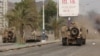 Officials: Scores Dead in Yemen Shelling